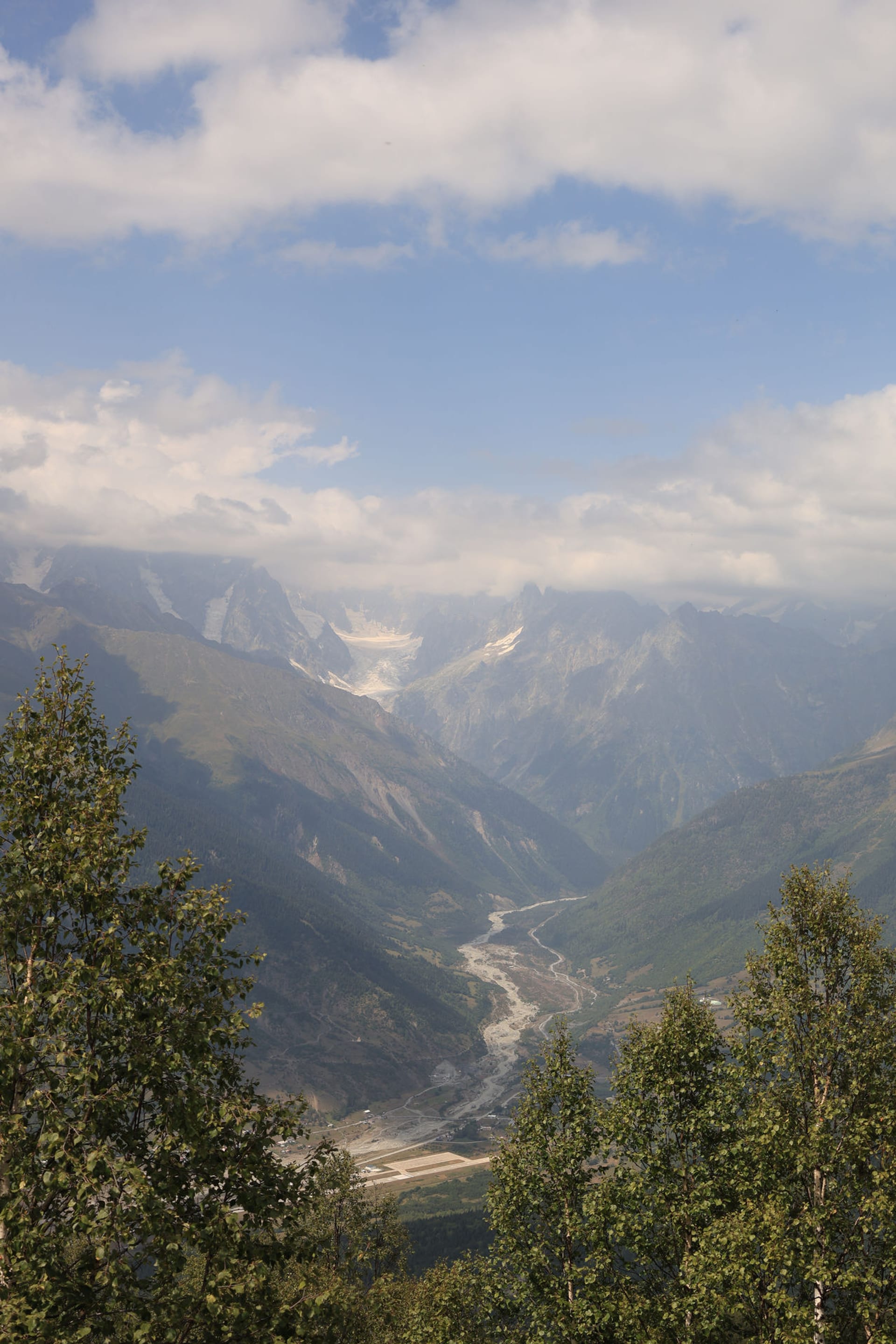 Georgian mountain road with a Caucasus panorama